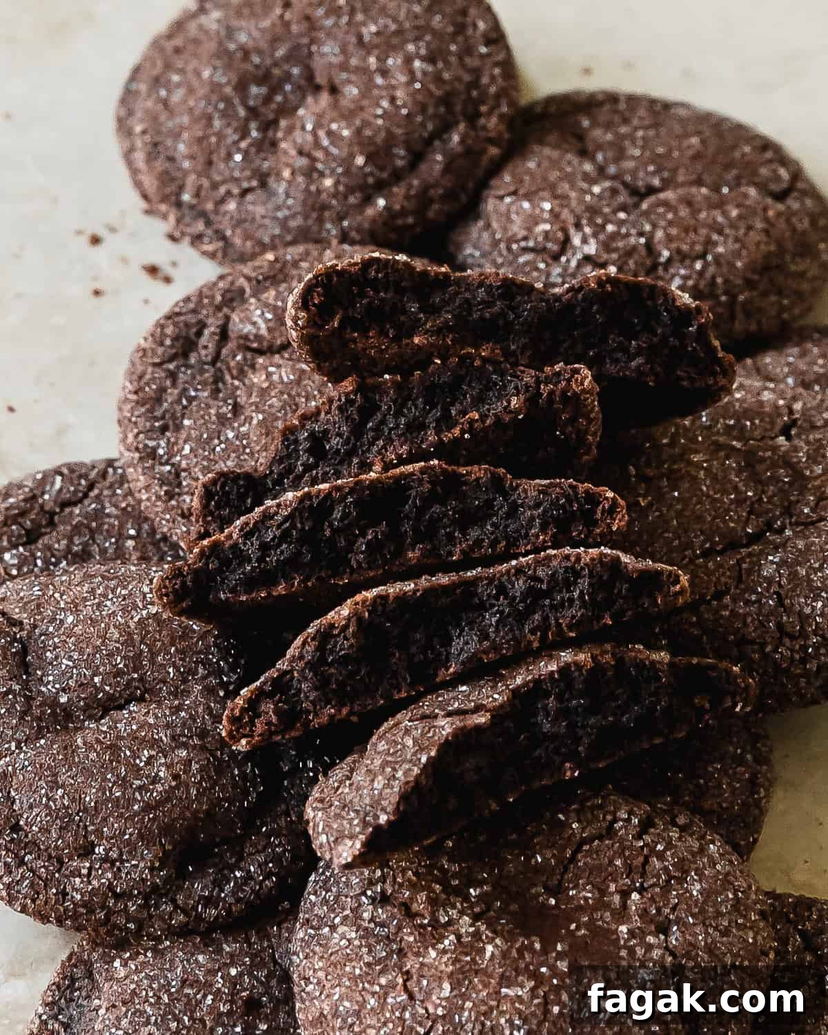 Chocolate sugar cookies are rich and fudgy, deeply chocolatey sugar cookies. These soft and chewy chocolate cookies are quick and easy to make and are the perfect cookie for any holiday gathering. 