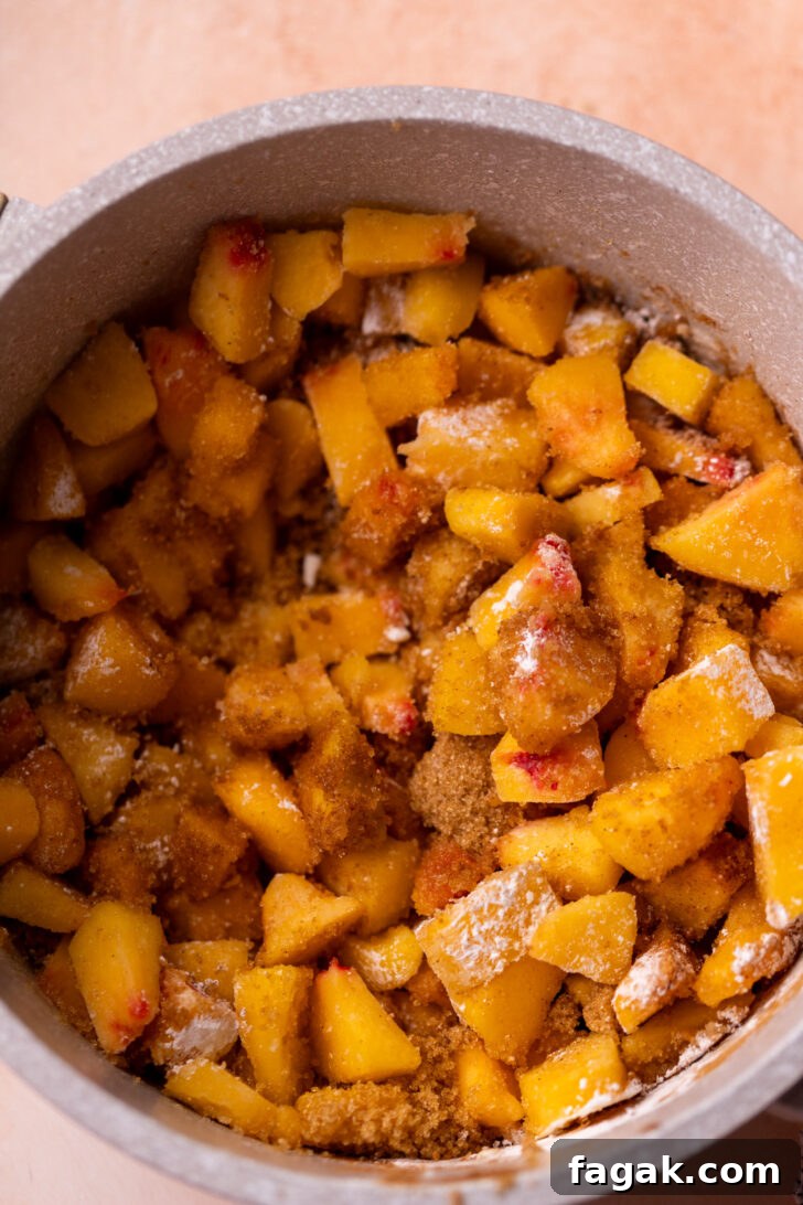 Homemade Peach Pie Filling Recipe for Canning and Baking 5 Peaches in a pan.