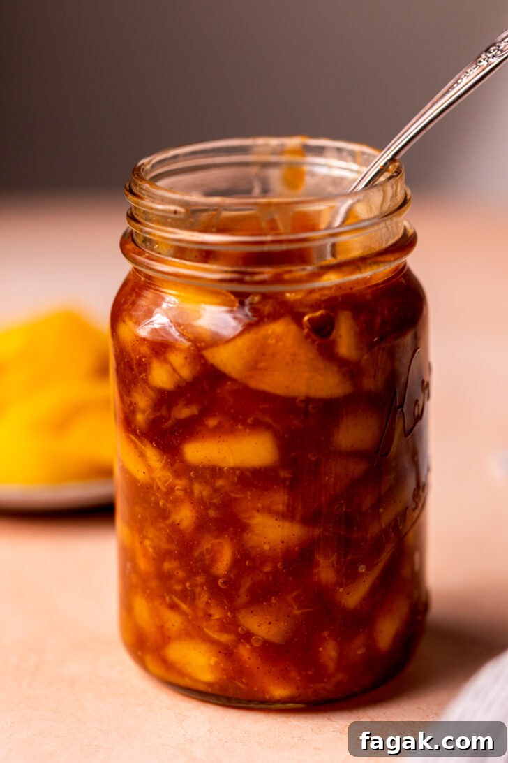 Homemade Peach Pie Filling Recipe for Canning and Baking 7 Peach pie filling in a jar.