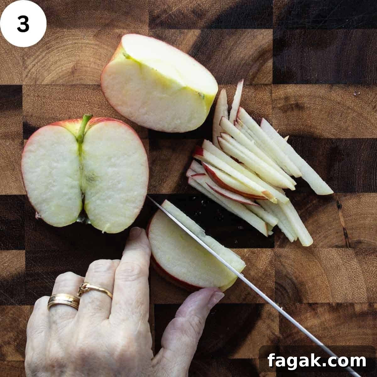 Cutting apple quarters into thin sticks.