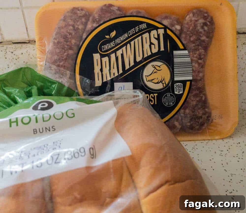 raw bratwurst and pack of buns to be smoked