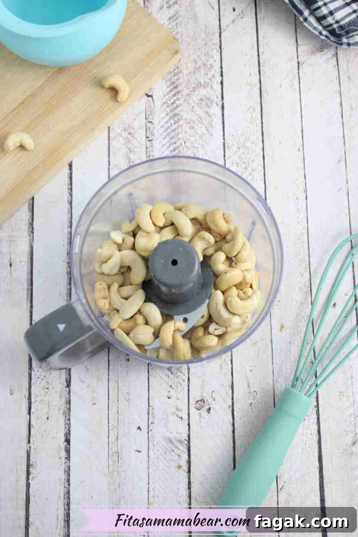 Paleo Dark Chocolate Bliss Balls Recipe for Quick Snacks 4 Cashews in a mini food processor.
