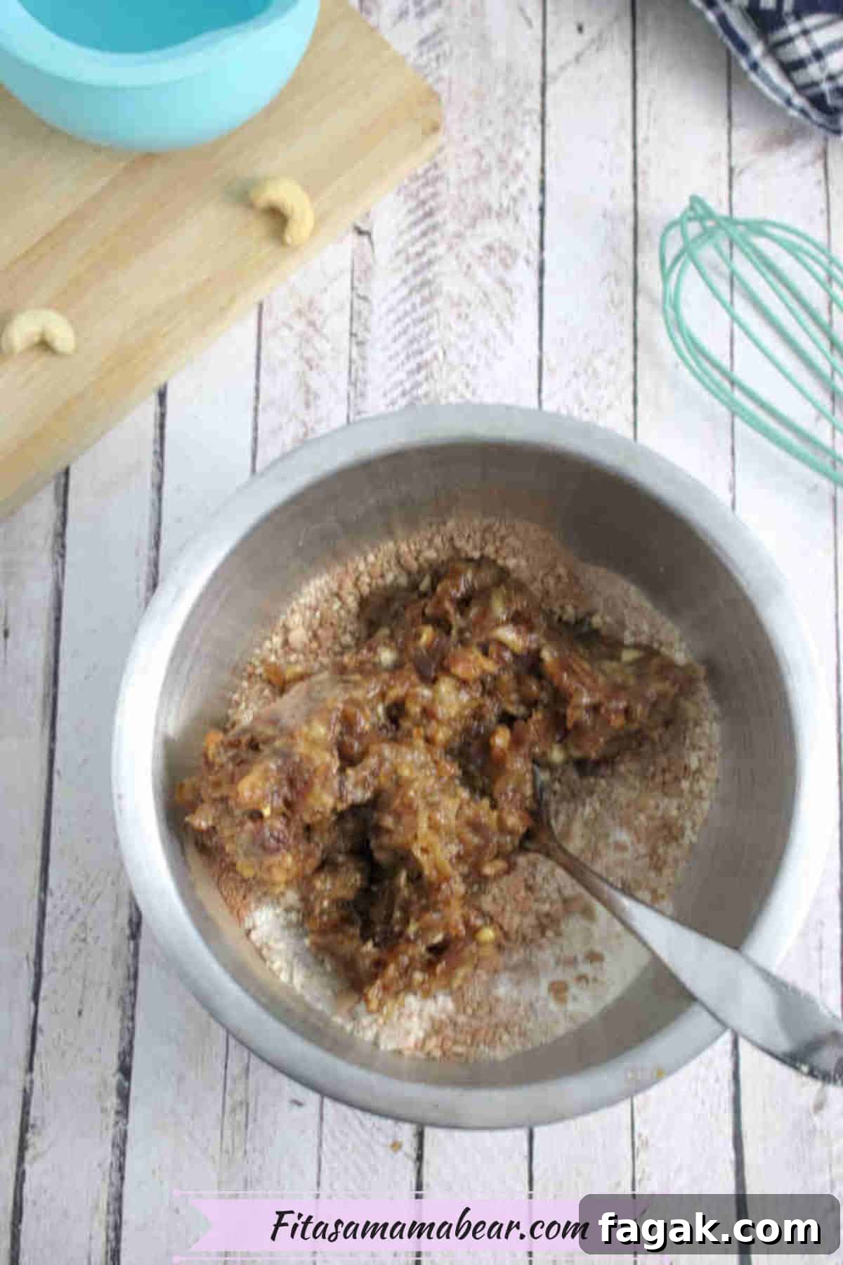 Paleo Dark Chocolate Bliss Balls Recipe for Quick Snacks 7 Steel bowl with dates and chopped nuts in it.