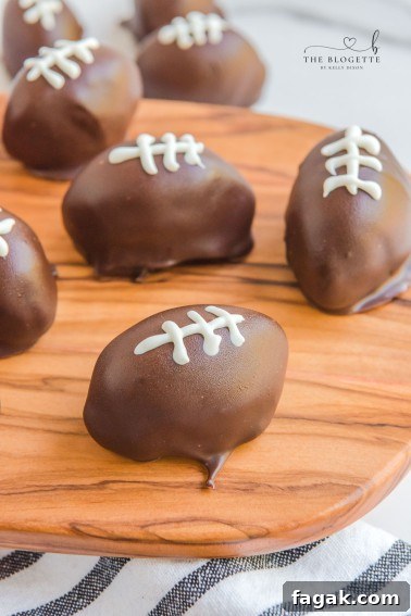 Oreo Football Truffles are perfect for the Super Bowl, Tailgating Parties, or even just to snack on during the game! Only 5 ingredients!
