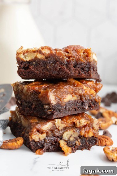 Pecan Pie Brownies are fudgy chocolate brownies topped with a pecan pie filling for an irresistible dessert. This is a Thanksgiving FAVORITE but is delicious all year long.