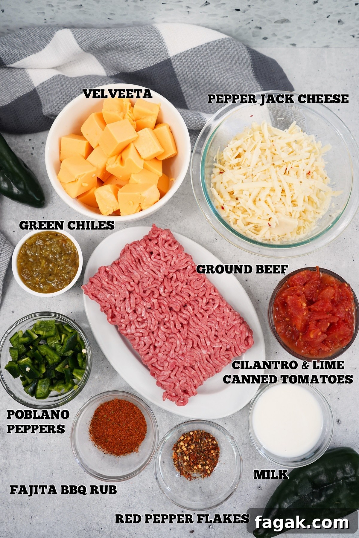 Smoked Queso Dip labeled Ingredients in bowls Smoked Queso Dip labeled Ingredients in bowls