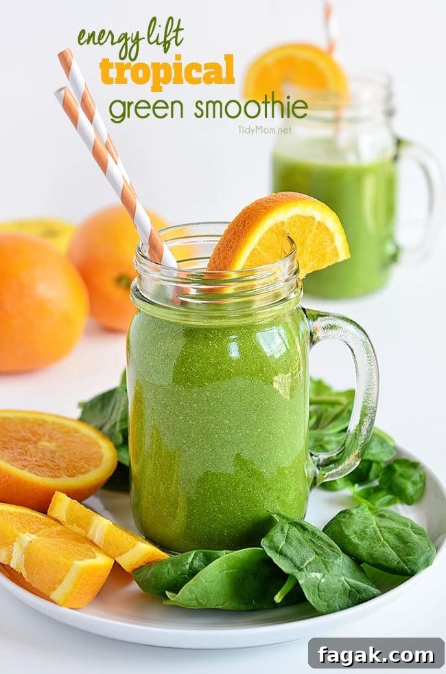  Energy Lift Tropical Green Smoothie with straws on a plate