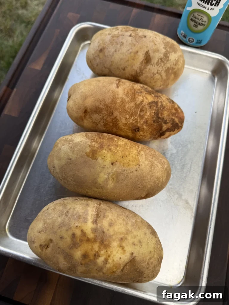 prepped potatoes on a gray pan