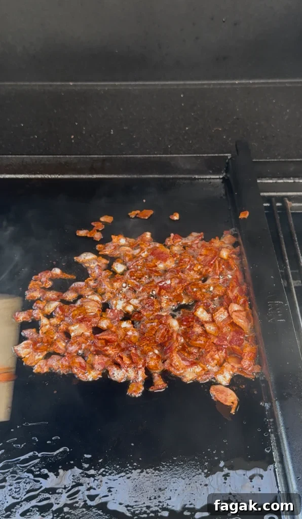 cooked bacon on the flat top