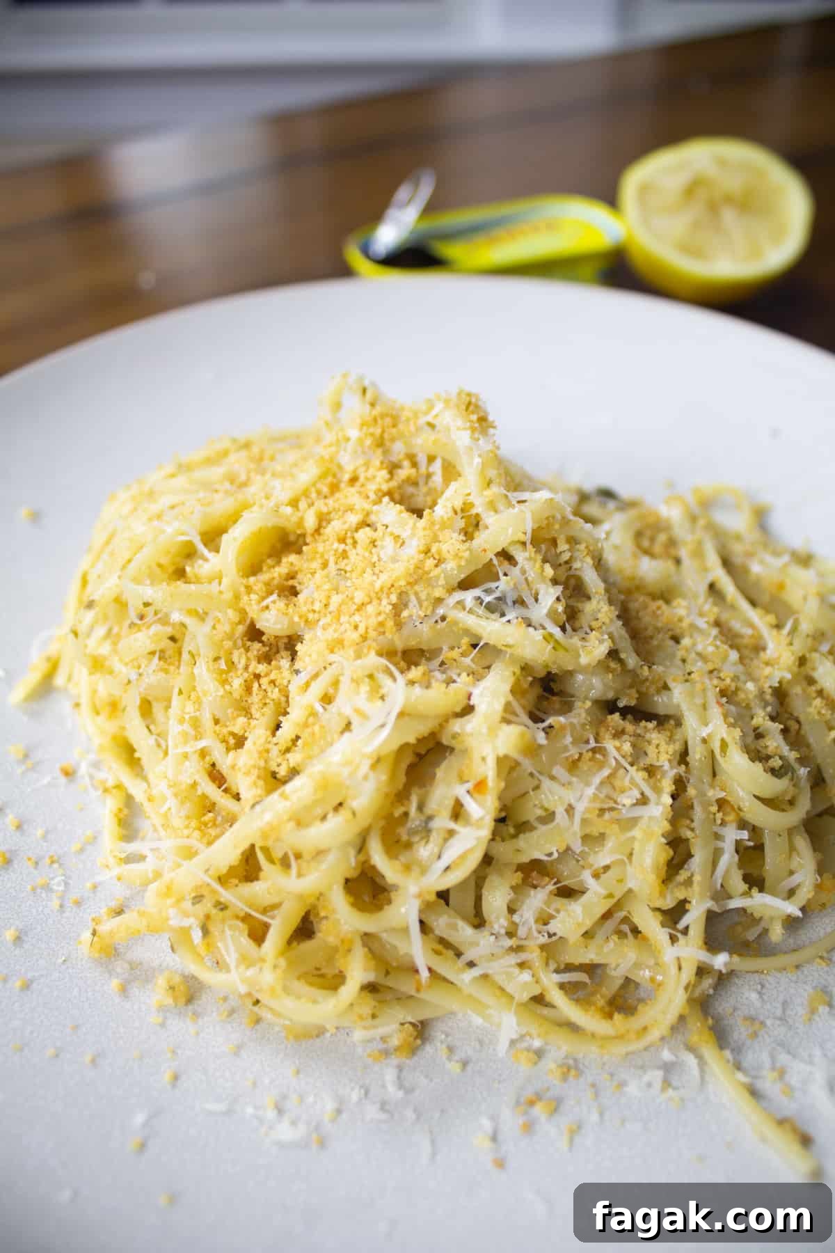 Close up of lemon garlic anchovy linguine with toasted bread crumbs