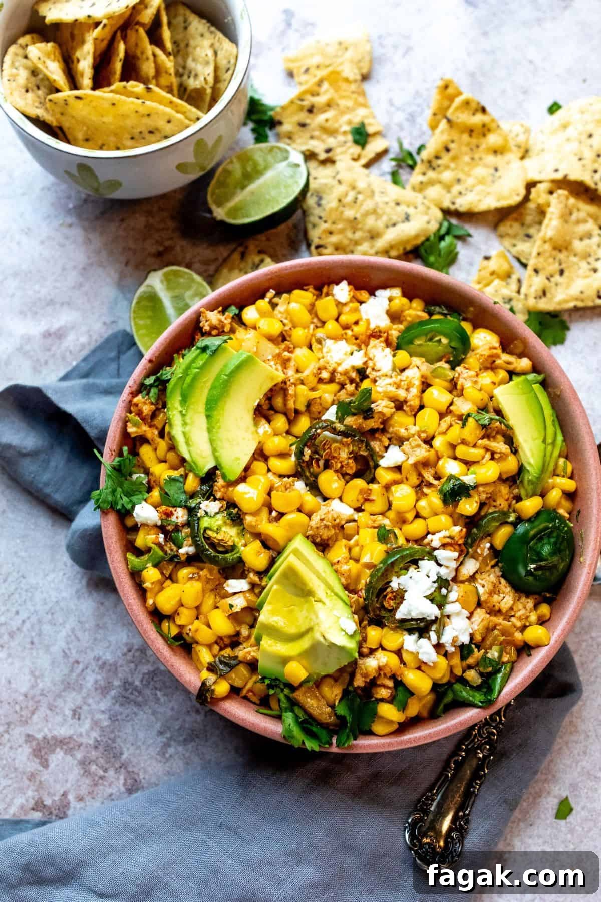 An image of Mexican street corn casserole in a serving bowl.