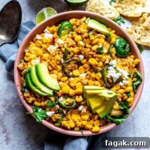 An image of Mexican street corn casserole in a serving bowl.