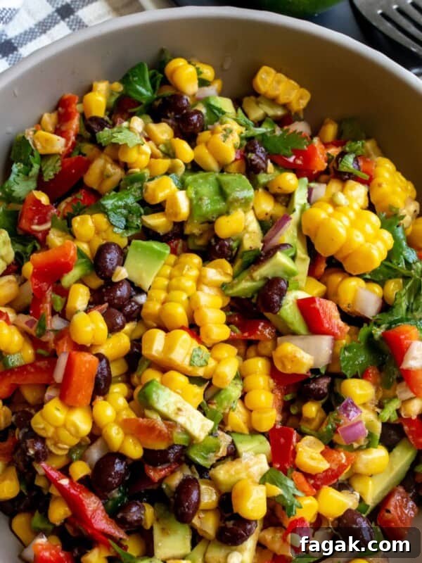 Avocado Corn Salad in a grey bowl.