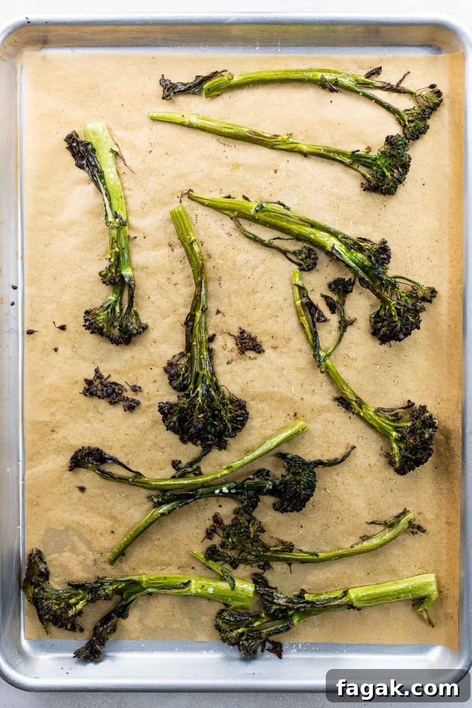 crispy broccolini roasted to perfection on a sheet pan