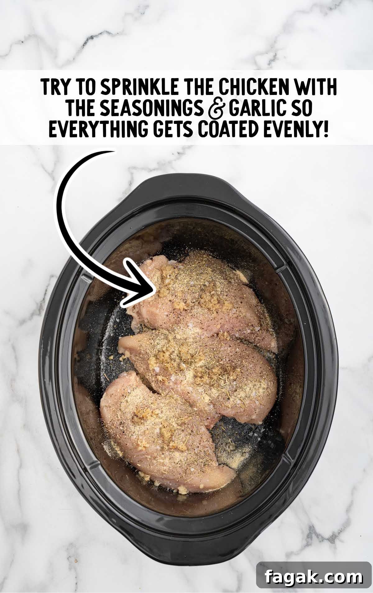 chicken sprinkled with minced garlic, kosher salt, black pepper, onion powder, and Italian seasoning in a slow cooker