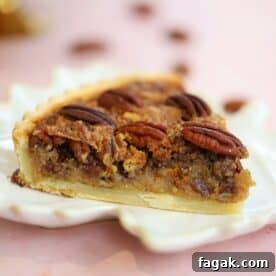A slice of gluten free pecan pie.