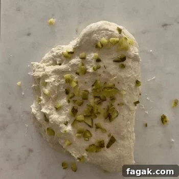 Dough with pickles during stretch and fold