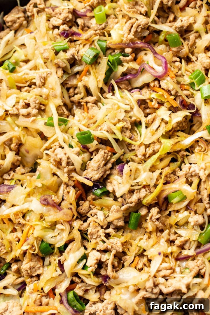 extreme close-up of egg roll in a bowl