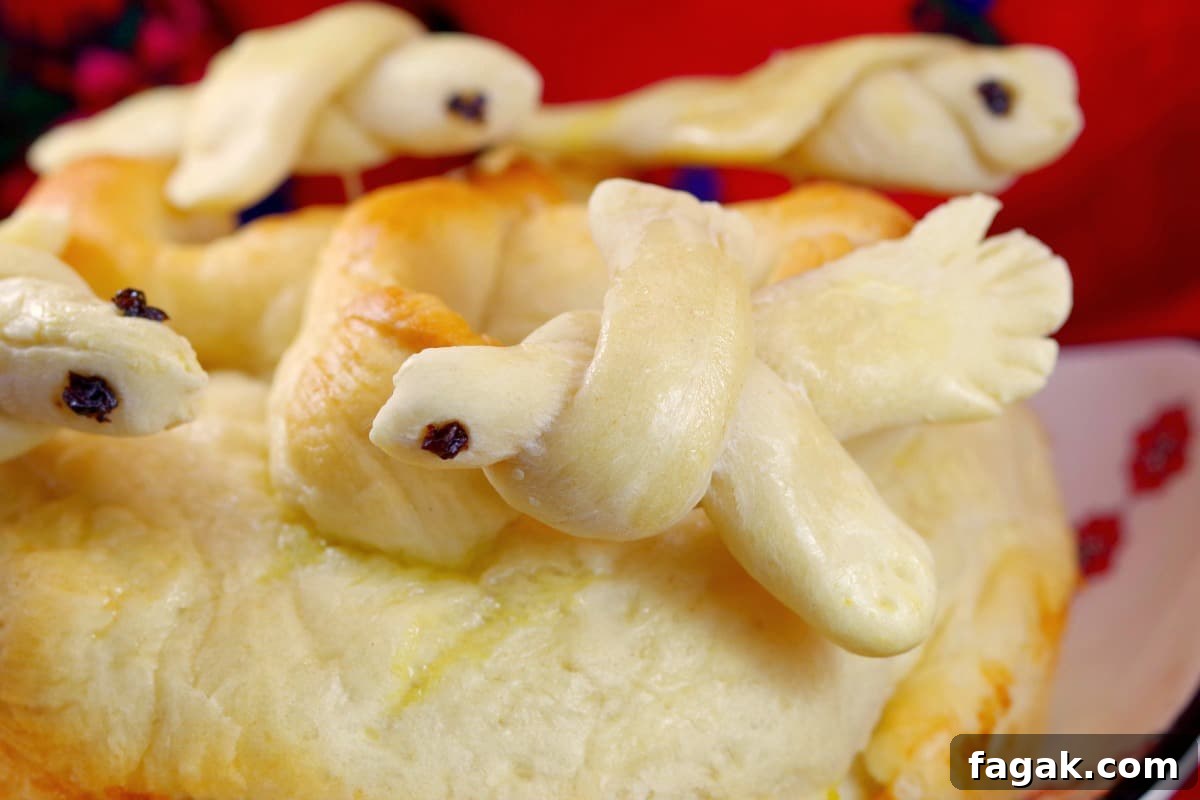 close up of edible Ukrainian Easter bread Dove used to decorate paska bread (sitting on bread)