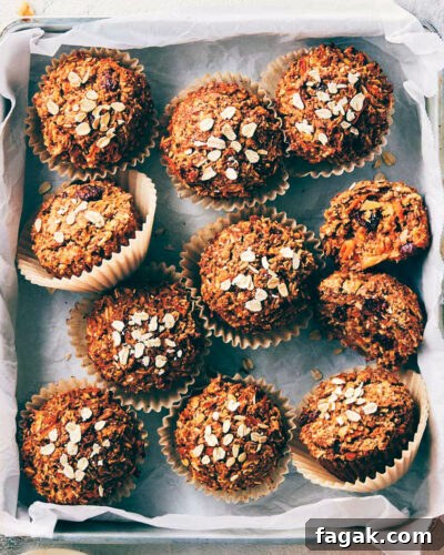 Baking pan of morning glory muffins fresh out of the oven