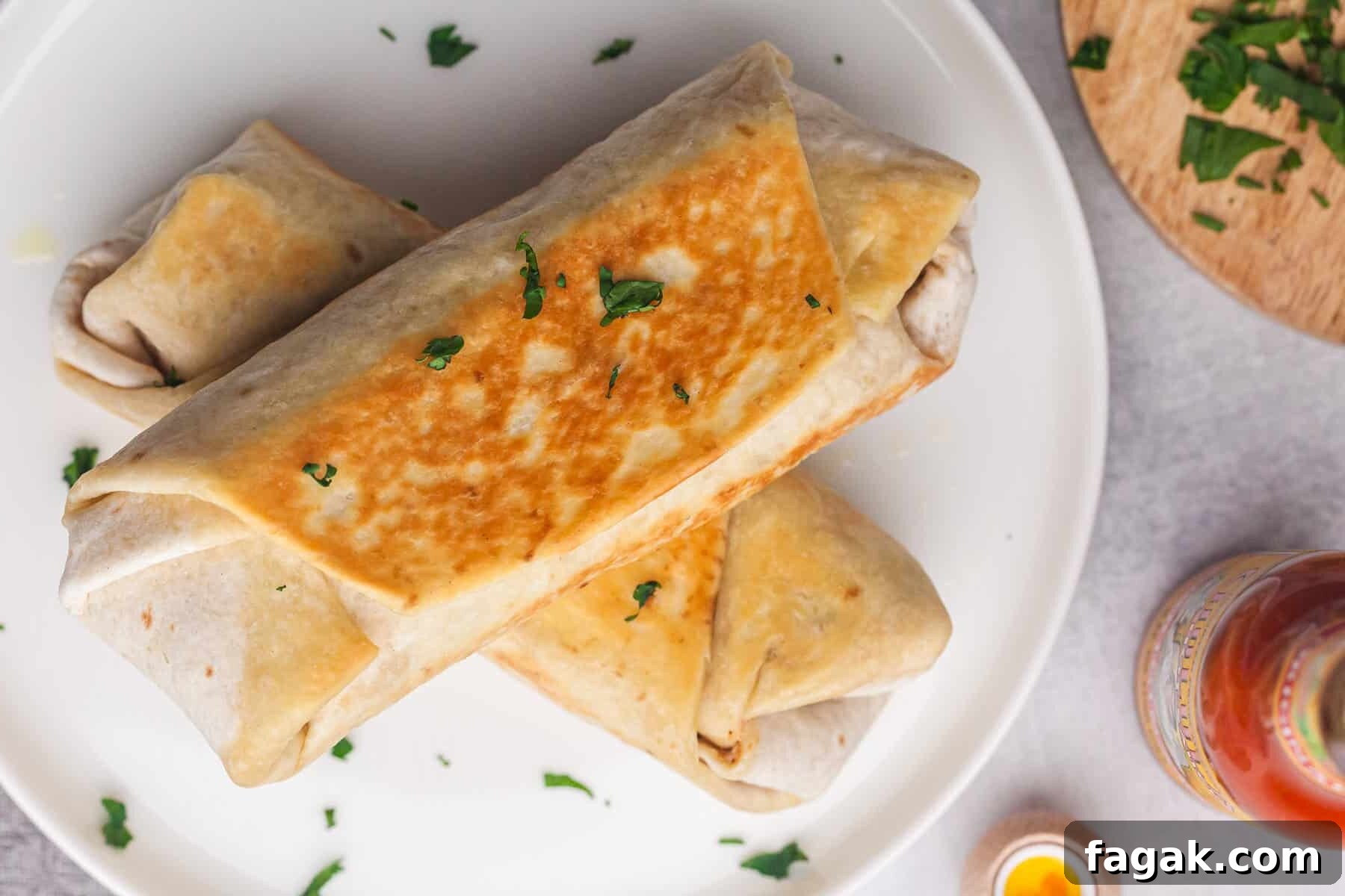 15 Filling Breakfast Recipes to Keep You Full Until Lunch 12 Cheesy Bean and Rice Burrito