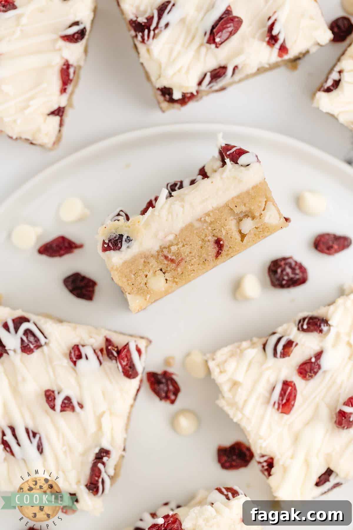 White Chocolate Cranberry Cookie Bars Recipe for Holiday Baking 6 White Chocolate Cranberry Cookie Bars are soft, chewy, and covered with cream cheese frosting and a white chocolate drizzle. This is a fantastic cookie bar recipe that is perfect for fall!