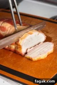 slicing smoked pork loin roast