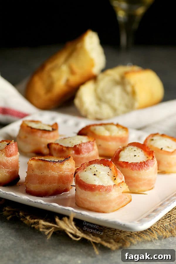 Bacon wrapped scallops on a plate