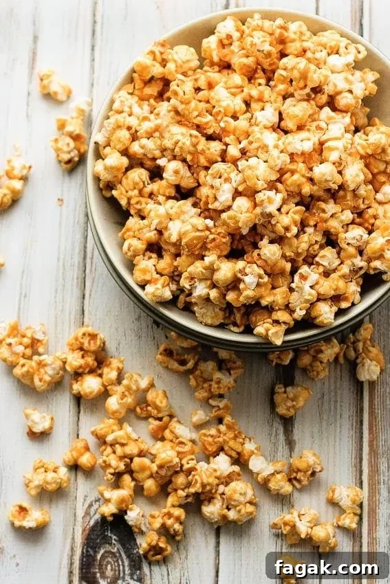 Homemade Gooey Caramel Corn Recipe for Movie Nights 2 Easy Caramel Corn - Caramel corn that's easy to make and tastes fantastic. The perfect snack or gift for the holidays!