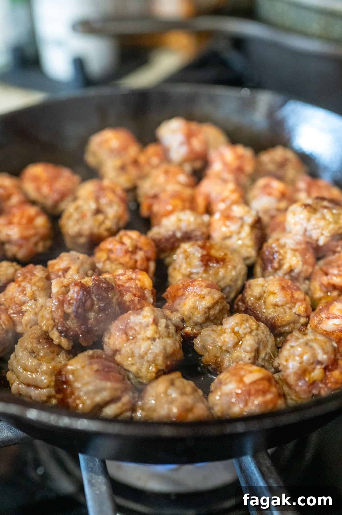 Italian meatballs cooking.