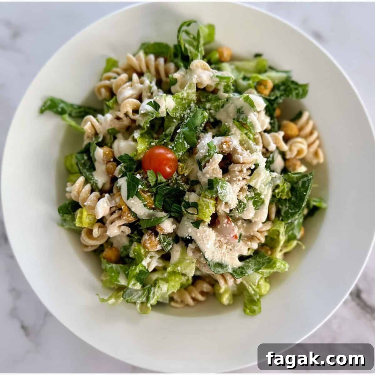 5-Minute Vegan Caesar Dressing Recipe: Creamy Plant-Based Dressing 5 Pasta salad recipe in a bowl on the table.