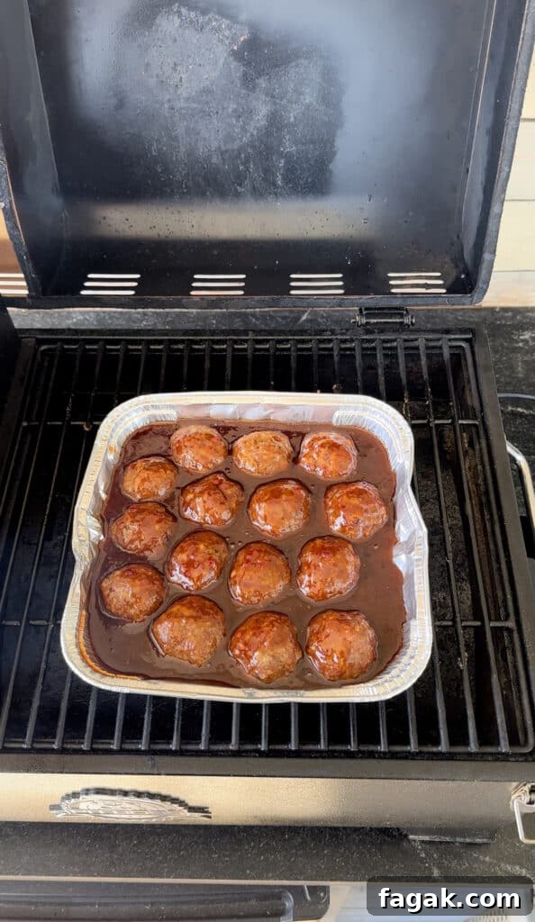Meatballs cooking in bbq sauce 