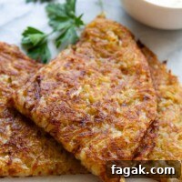 potato rosti folded and plated with parsley garnish.