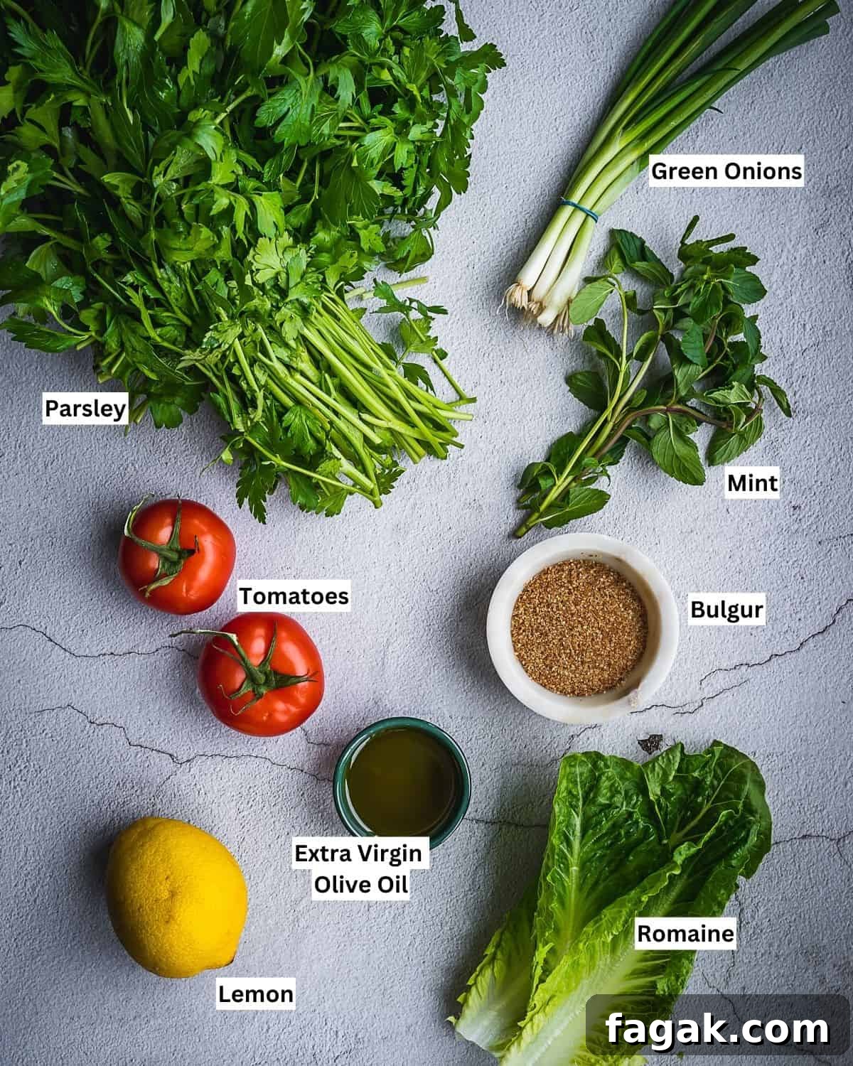 Lebanese tabbouleh salad ingredients on a board.