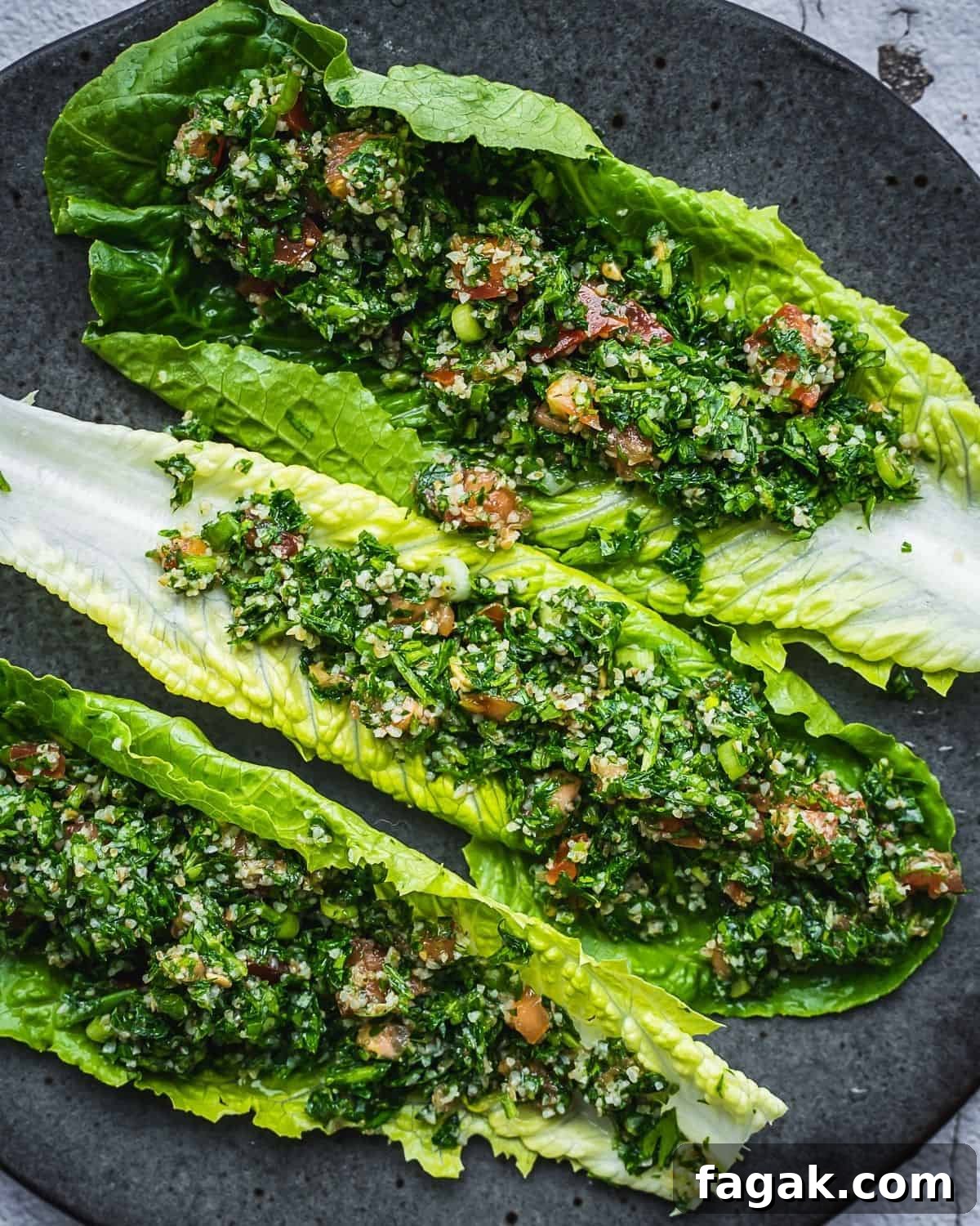 Romaine leaves filled with tabbouleh salad.