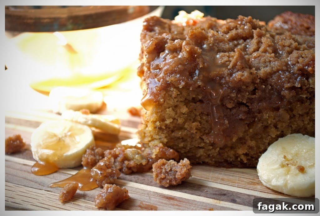 Banana Crumb Cake with Caramel Rum Sauce | OfBatterAndDough.com