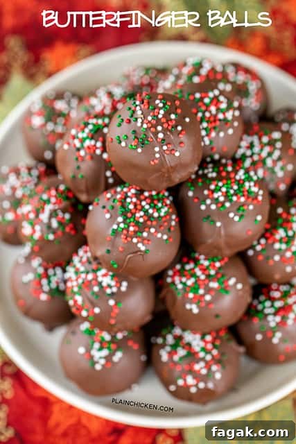 Butterfinger Balls - dangerously delicious!! Peanut butter, powdered sugar, graham crackers, Butterfinger bits, butter and chocolate candy coating.