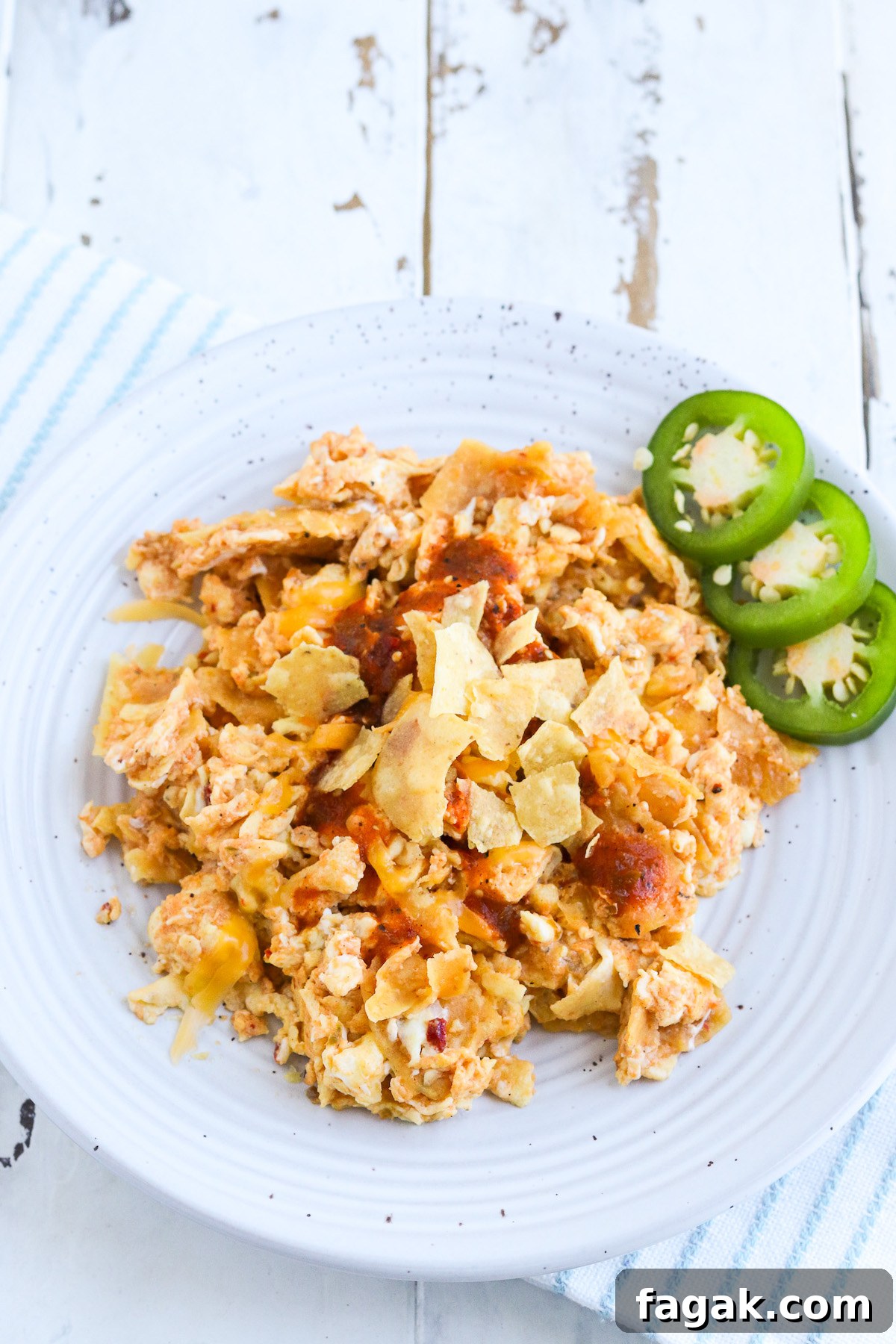 plate of cooked migas with jalapeno garnish