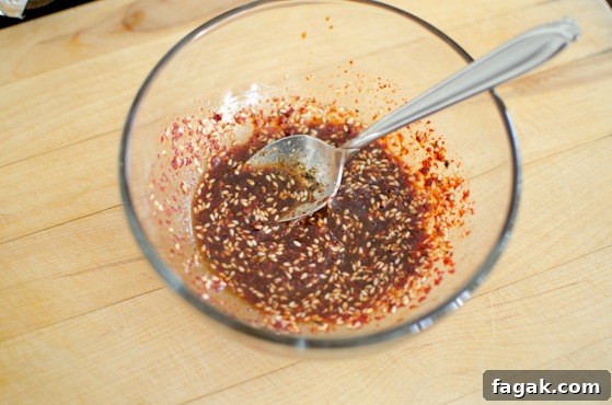 Make Korean onion salad dressing in a bowl.