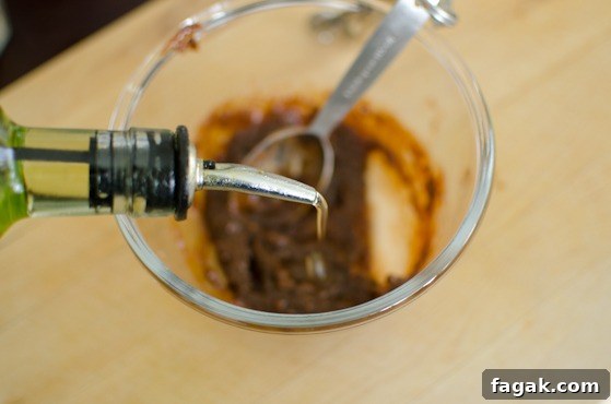 Add some oil to loosen up the seasoning paste
