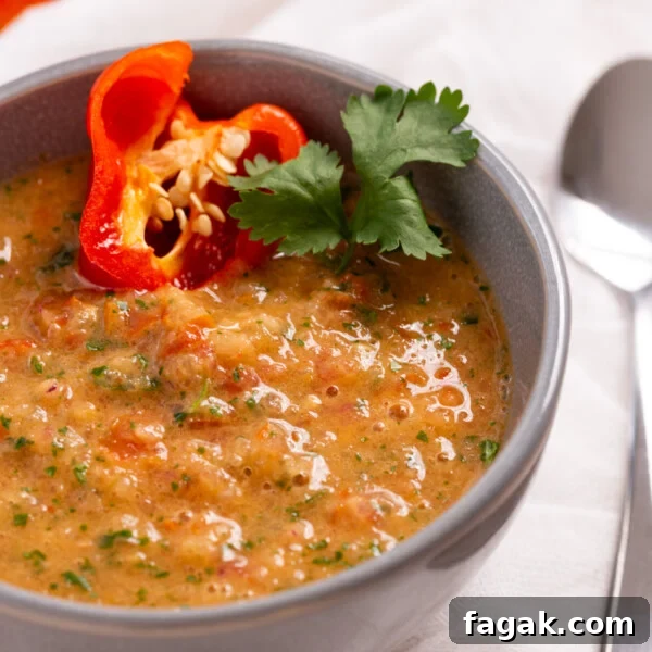 A close up image of habanero salsa in a small bowl.