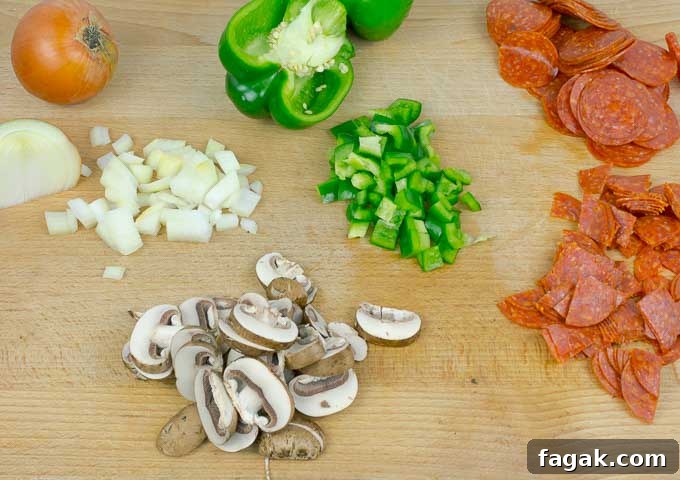 ingrediants for pizza sloppy joes on wooden board