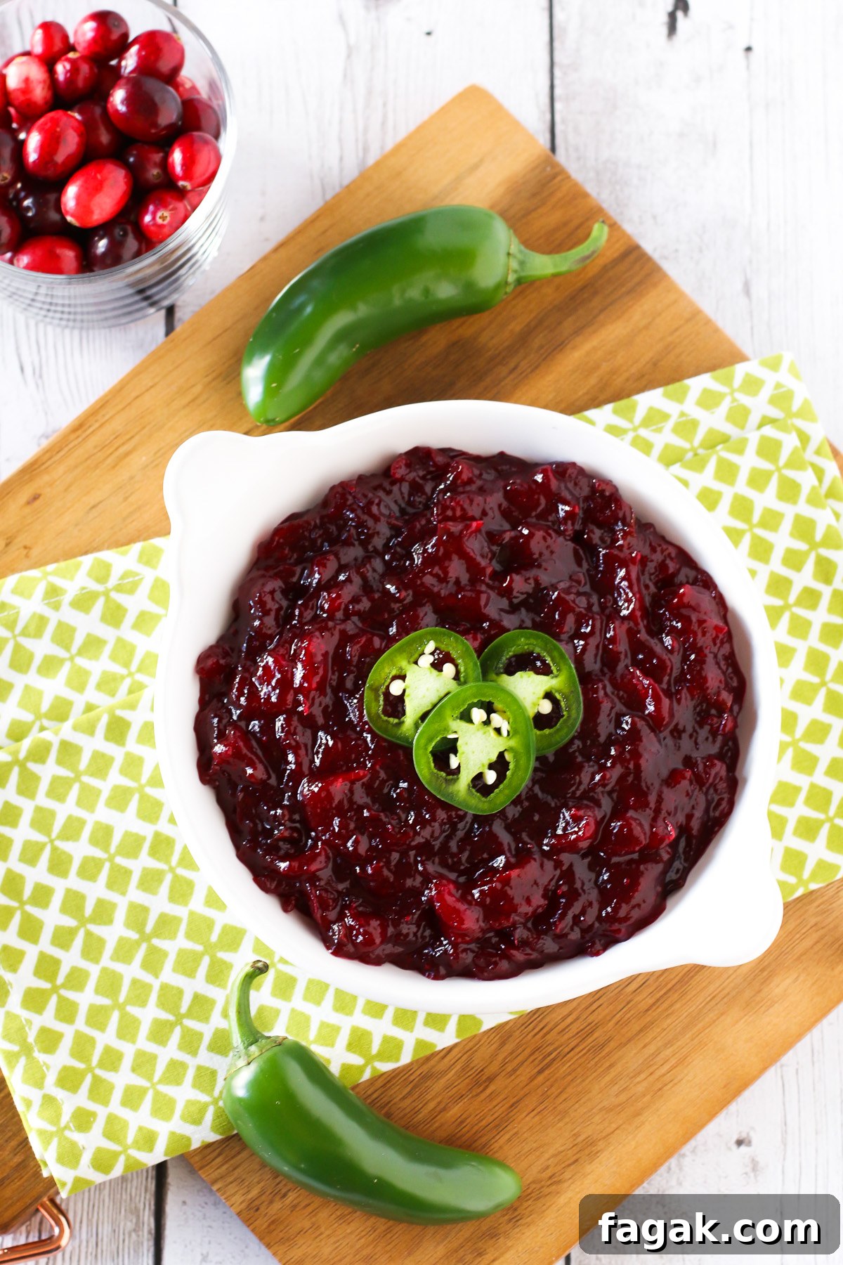 Sweet and Spicy Cranberry Jalapeño Chutney. Served on top of Glutino gluten free crackers with a little dairy free cream cheese and fresh jalapeño slices.