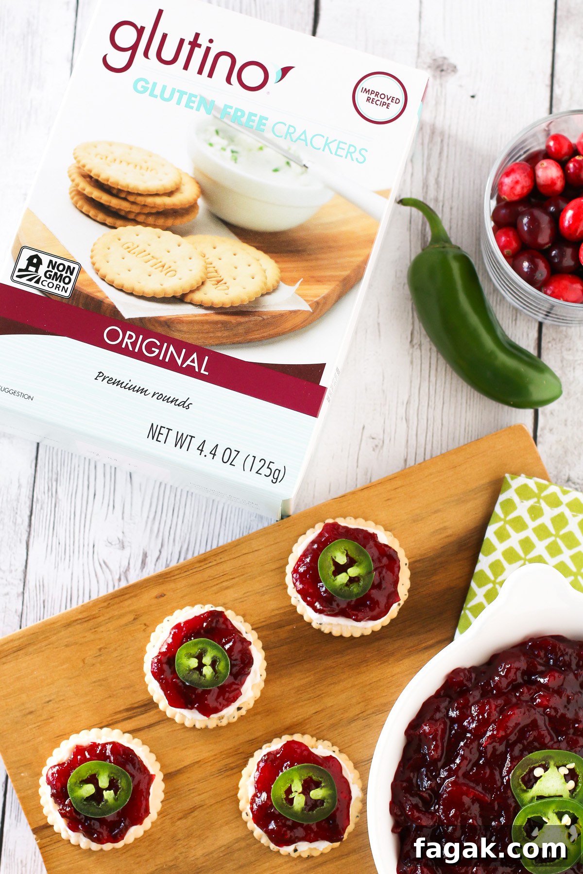 Sweet and Spicy Cranberry Jalapeño Chutney. Served on top of Glutino gluten free crackers with a little dairy free cream cheese and fresh jalapeño slices.