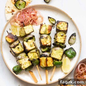 hariyali paneer tikka on skewers