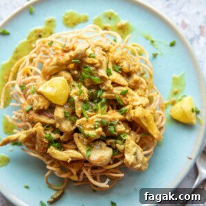 lemon chicken served on fried noodles