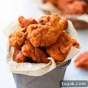popcorn chicken in a mini bucket