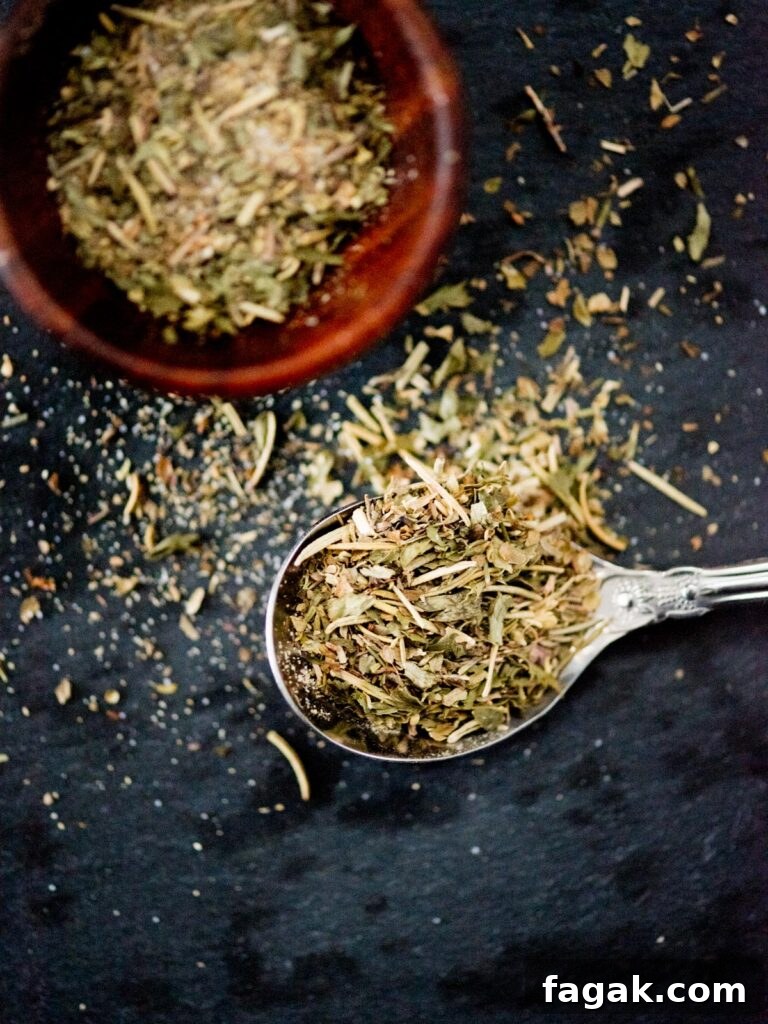Authentic Greek Seasoning Blend from Everyday Spices 5 dried Greek herb seasoning in a spoon