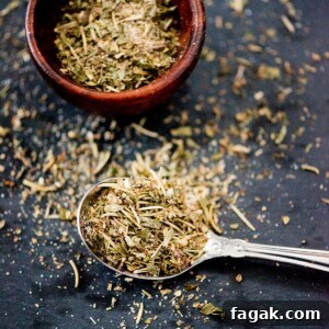 dried greek herbs in a spoon