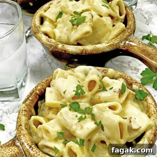 2 crocks mac and cheese on table